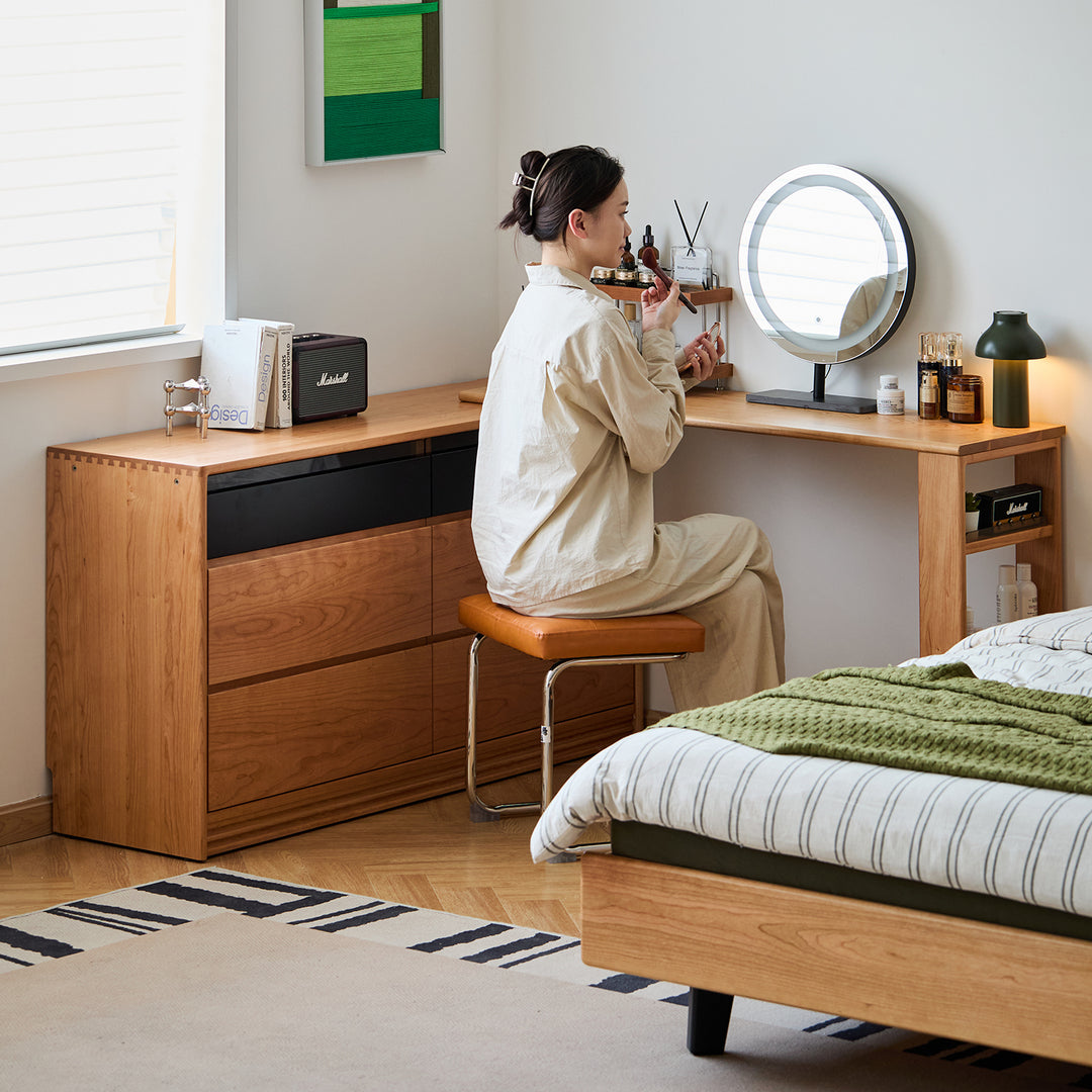 Scandinavian cherry wood dressing table shore in close up details.