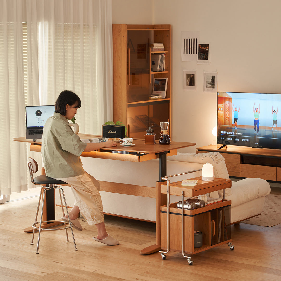 Scandinavian cherry wood electric height adjustable study table up environmental situation.
