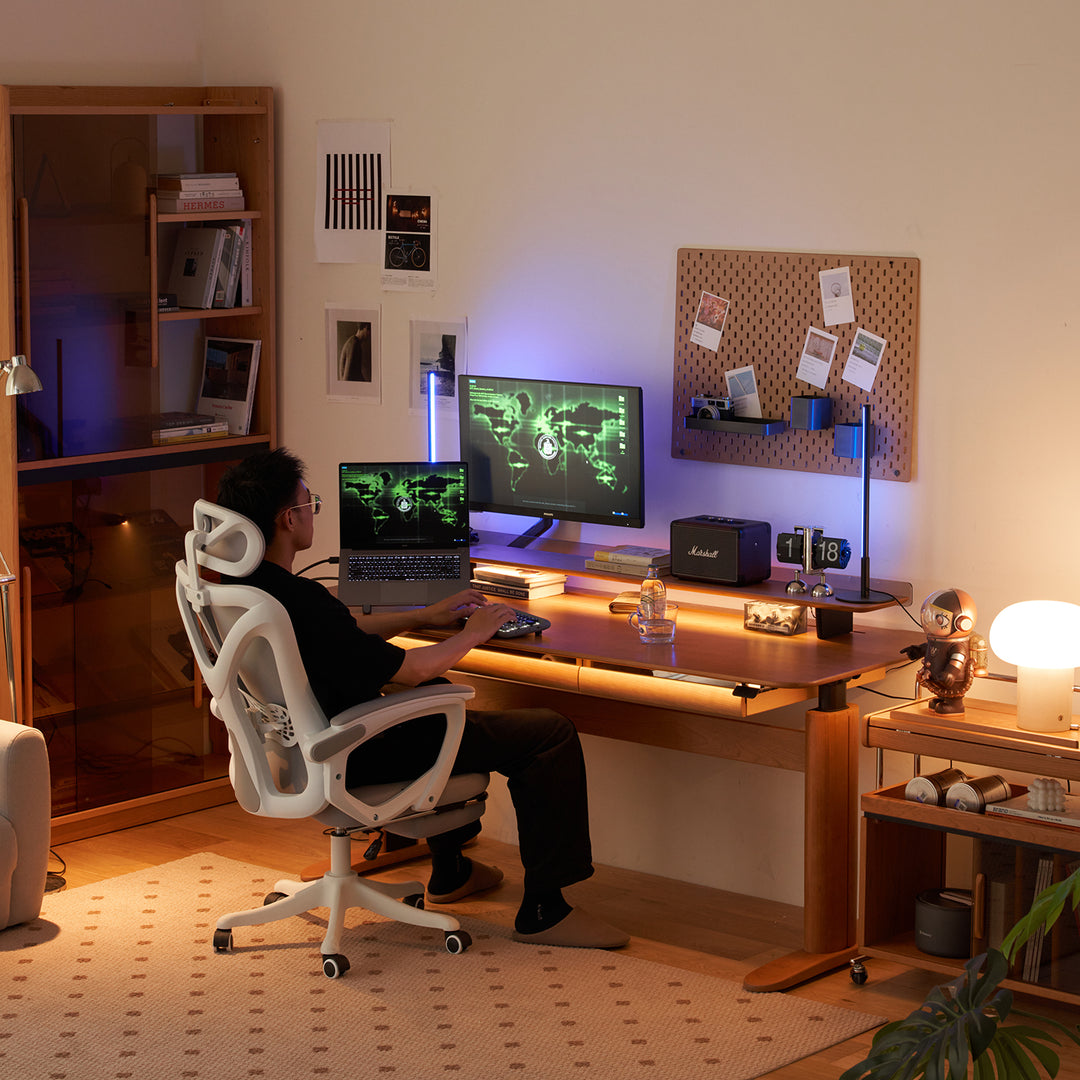 Scandinavian cherry wood electric height adjustable study table up in still life.