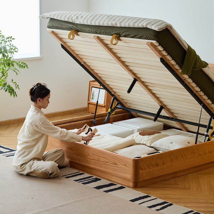 Scandinavian cherry wood lift-up storage bed square box in real life style.