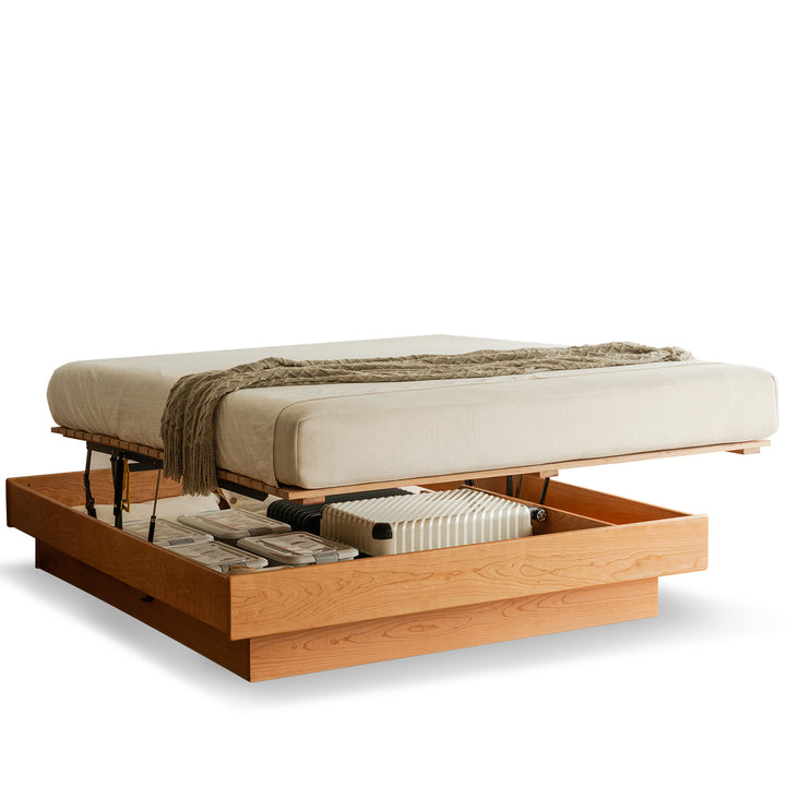 Scandinavian cherry wood lift-up storage platform bed  blue whale in white background.