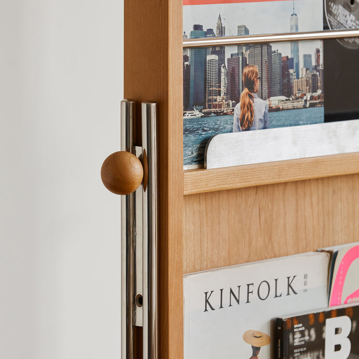 Scandinavian cherry wood wheeled mirror aura in still life.