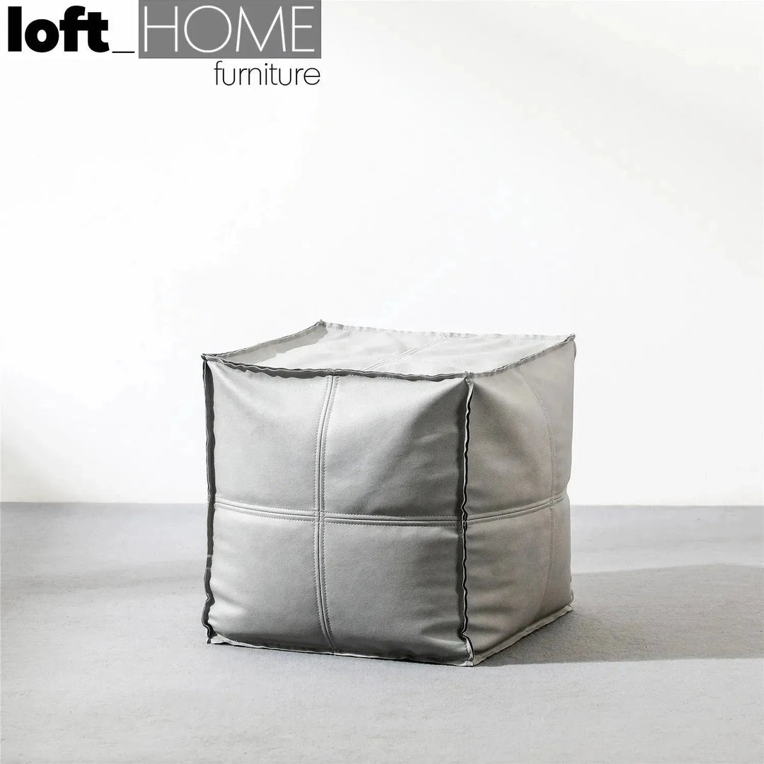 Modern fabric ottoman surya primary product view.