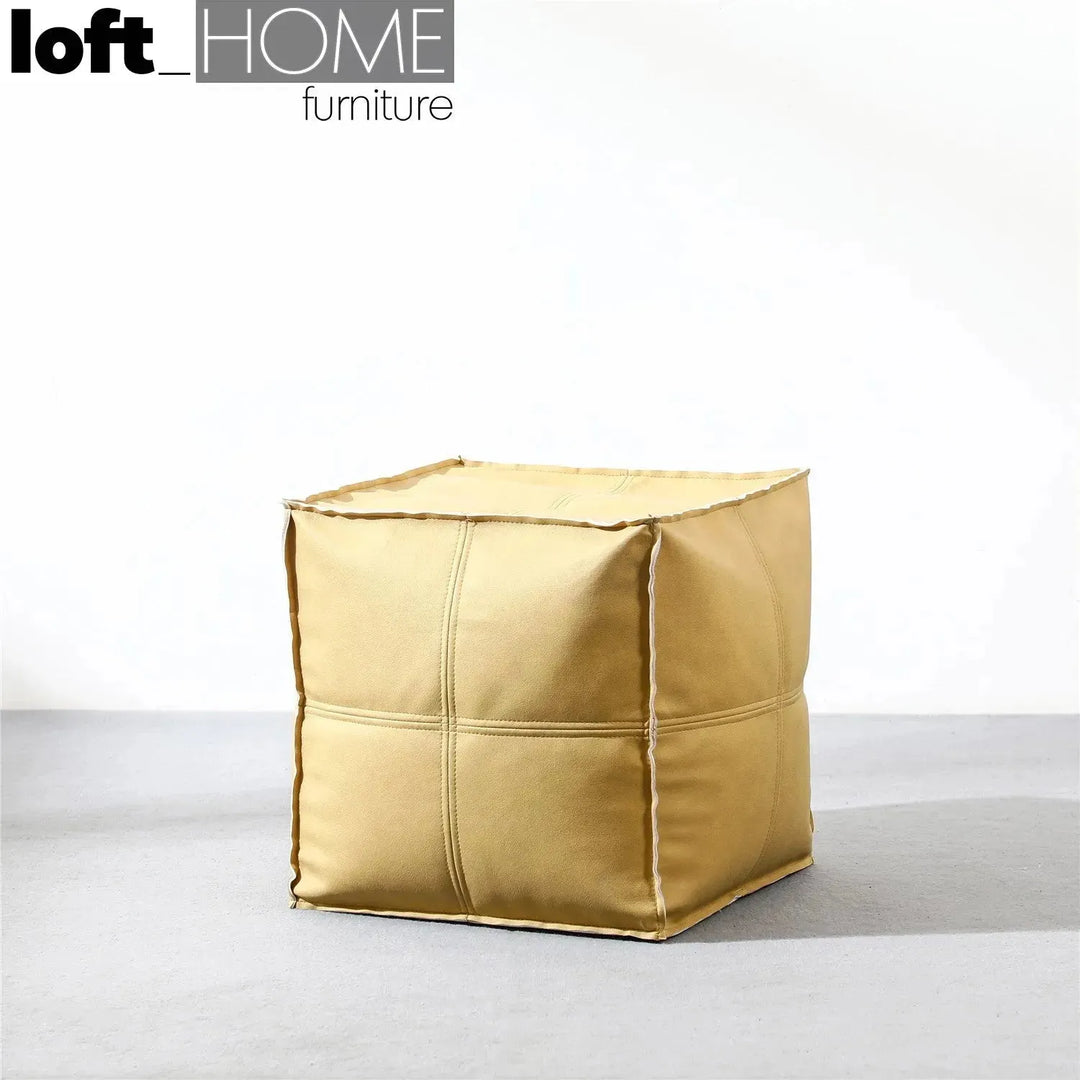 Modern fabric ottoman surya in panoramic view.