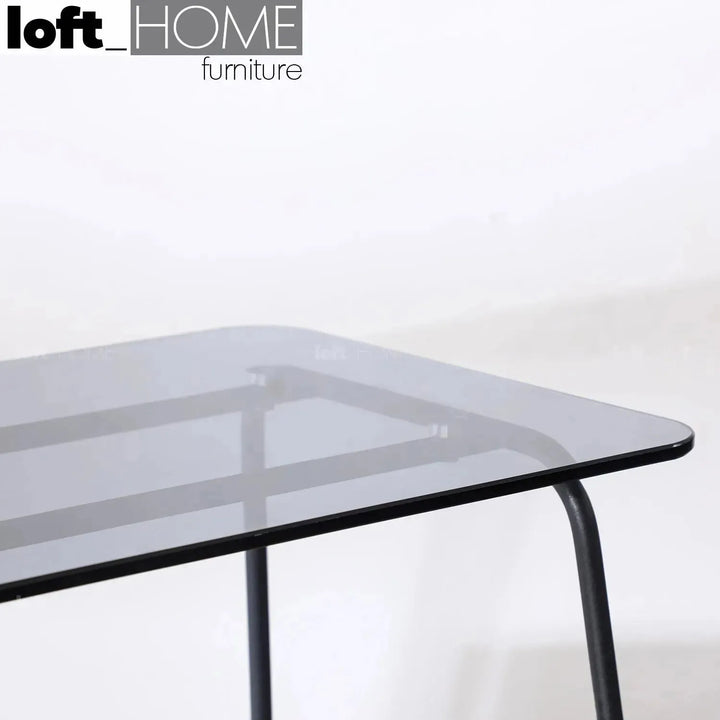 Industrial glass top side table vena in details.