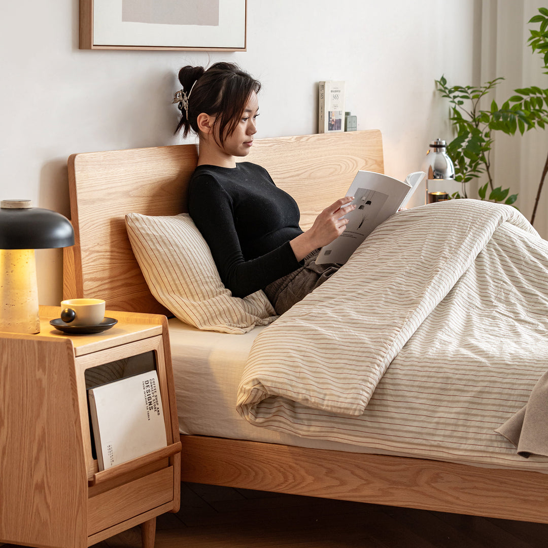 Scandinavian oak wood bed solid in still life.