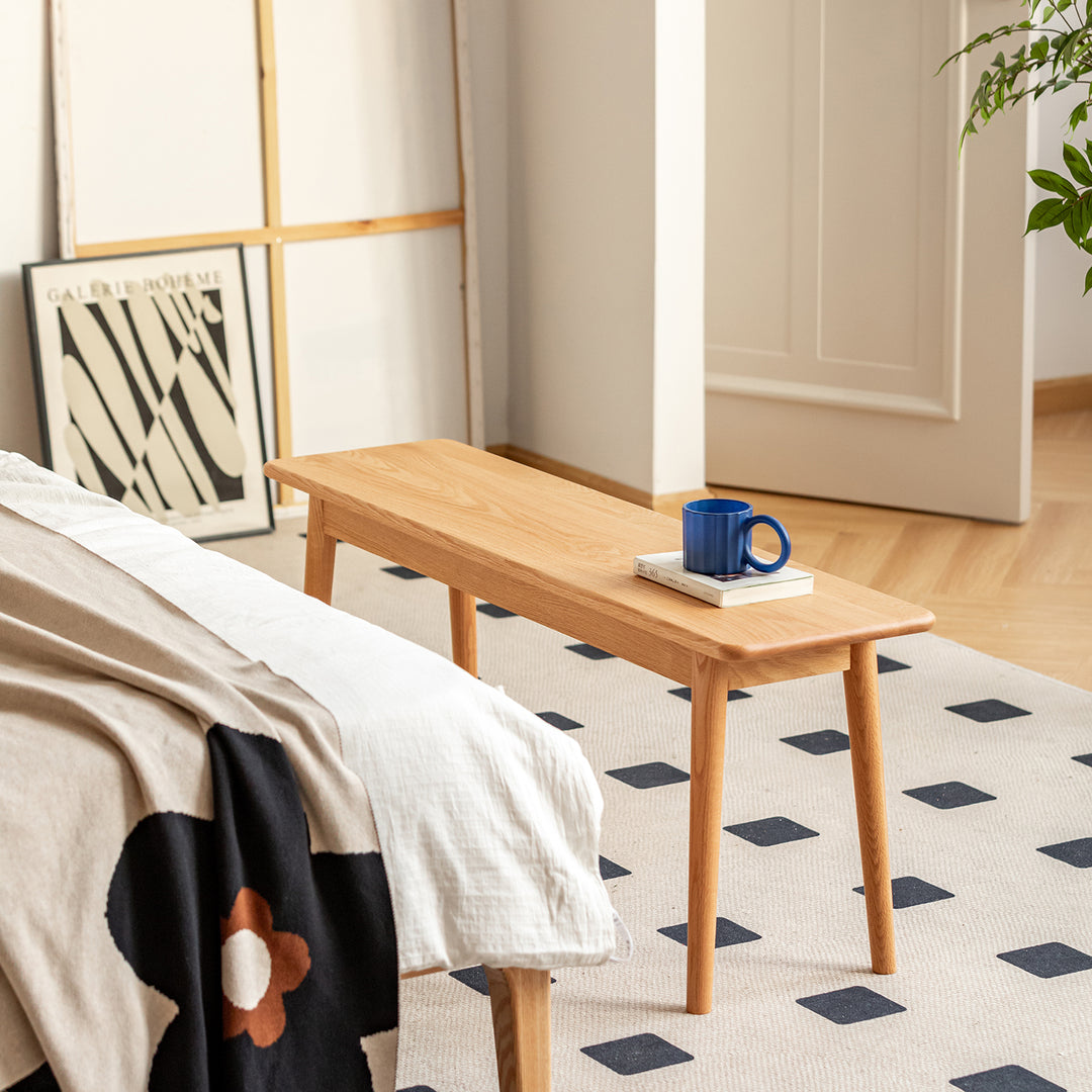 Scandinavian oak wood dining bench green in panoramic view.
