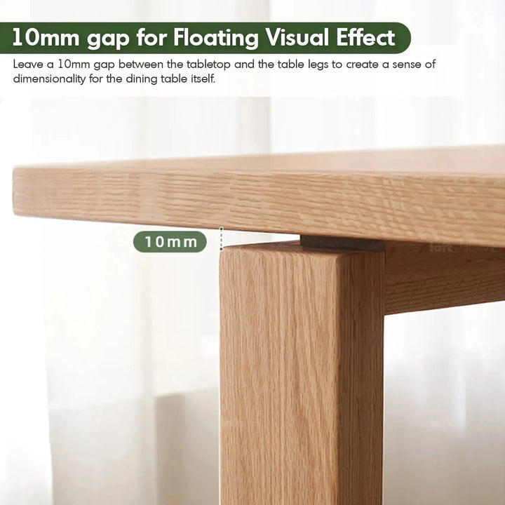 Scandinavian oak wood dining table kumo with context.