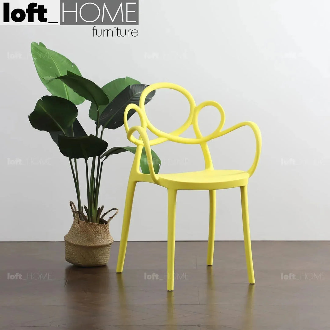 Contemporary plastic armrest dining chair mina color swatches.