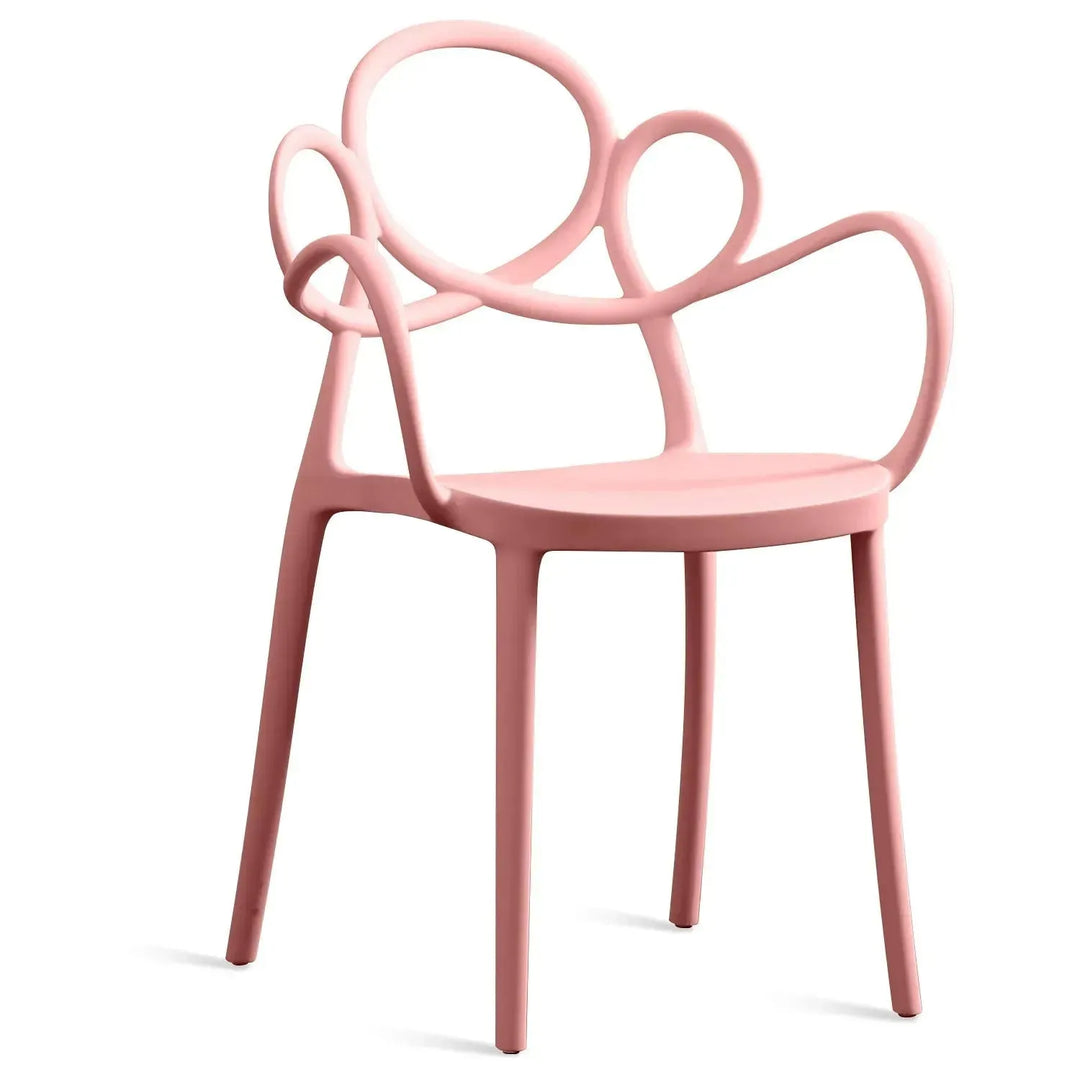 Contemporary plastic armrest dining chair mina in still life.