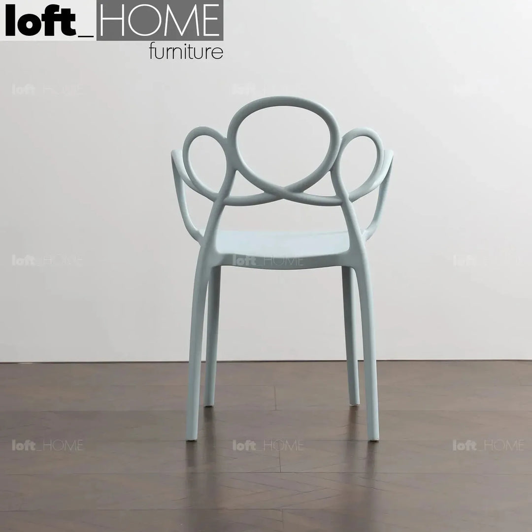 Contemporary plastic armrest dining chair mina in details.