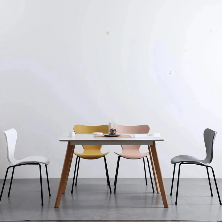 Contemporary plastic dining chair ant in panoramic view.