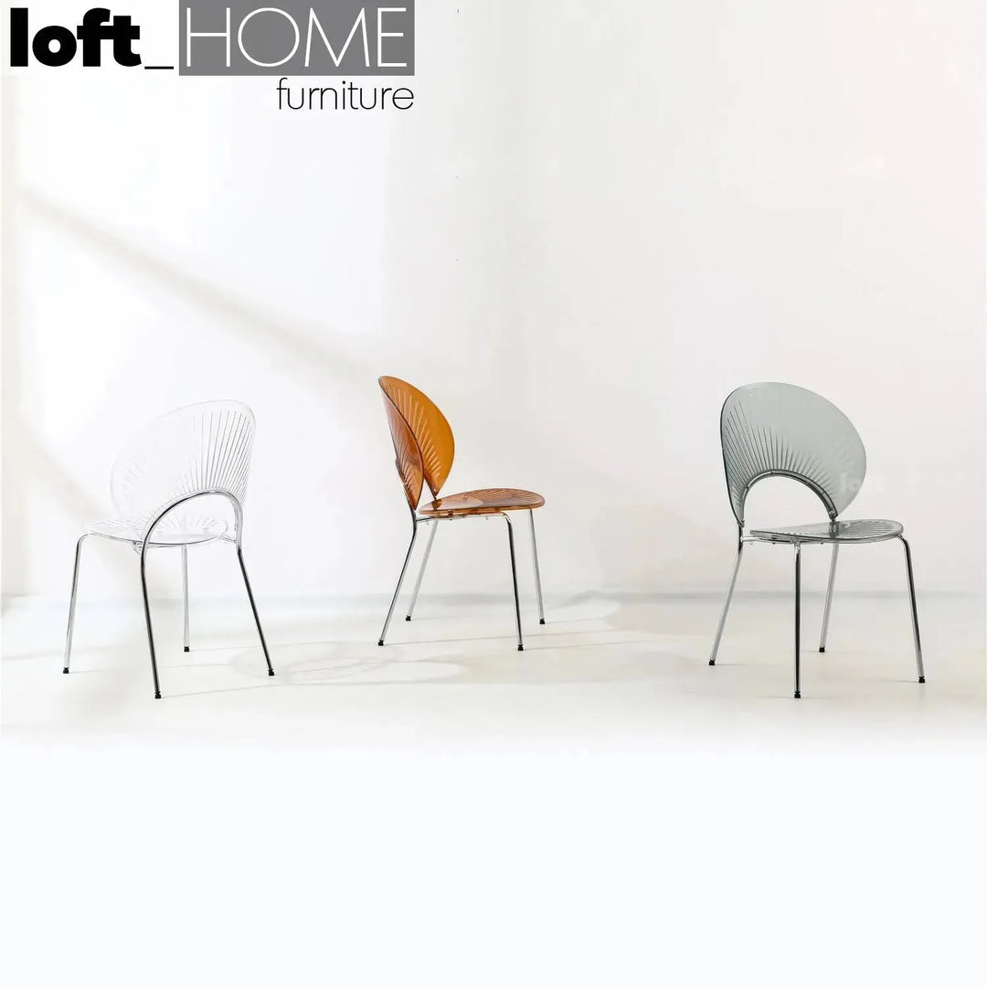 Contemporary plastic dining chair apollo clear in close up details.