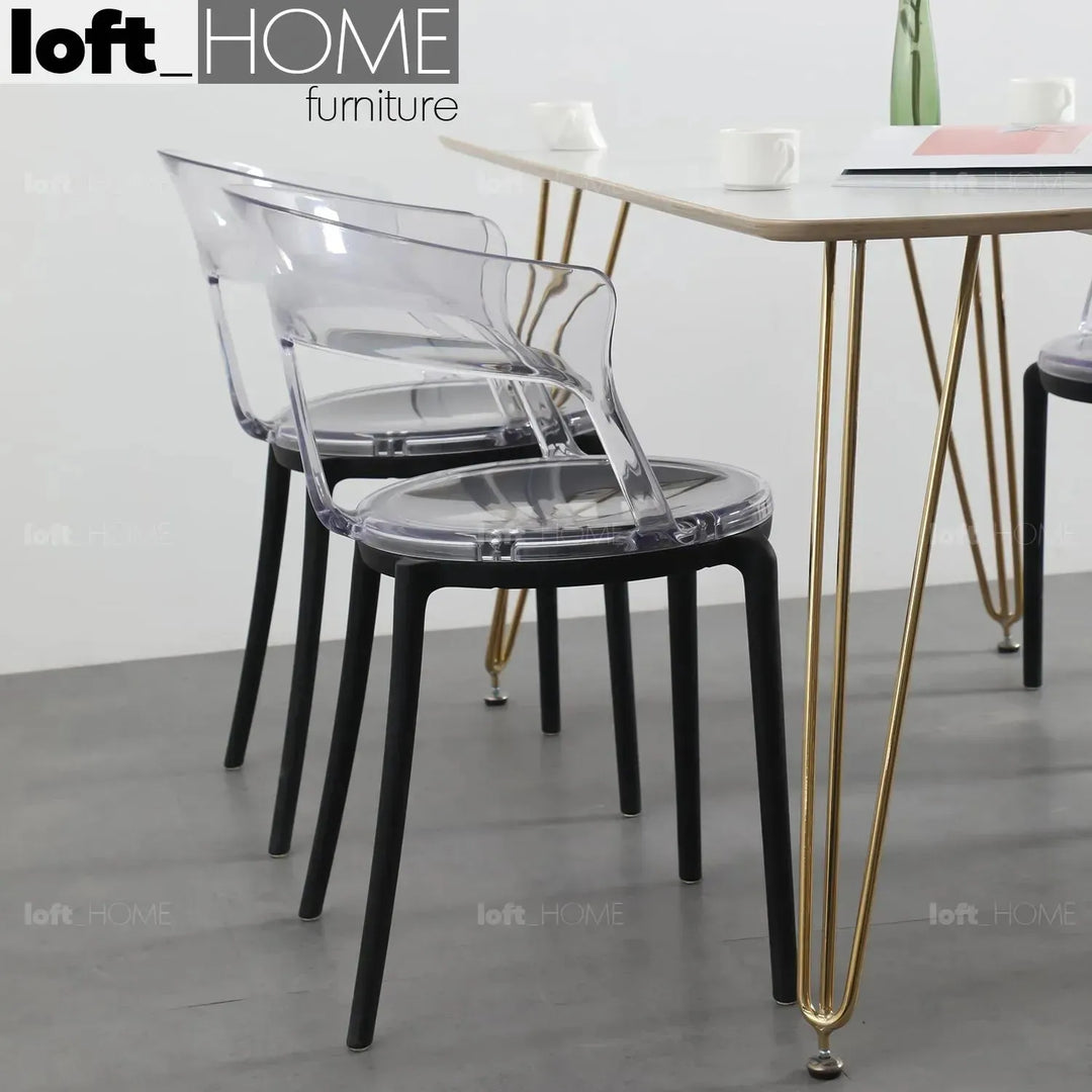 Contemporary plastic dining chair renzo in real life style.