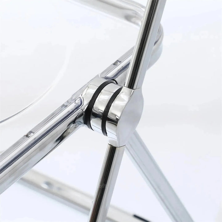 Contemporary plastic foldable dining chair fikas with context.