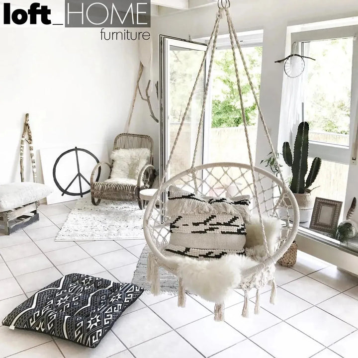 Scandinavian woven rope hanging chair 1 seater sofa net in close up details.
