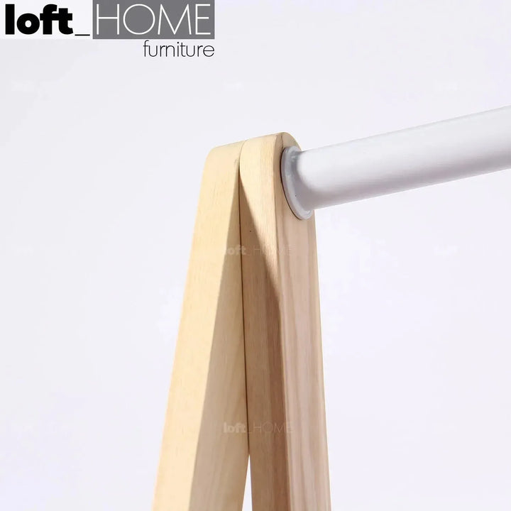 Modern wood cloth hanger toj in panoramic view.