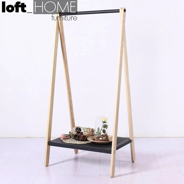 Modern wood cloth hanger toj primary product view.