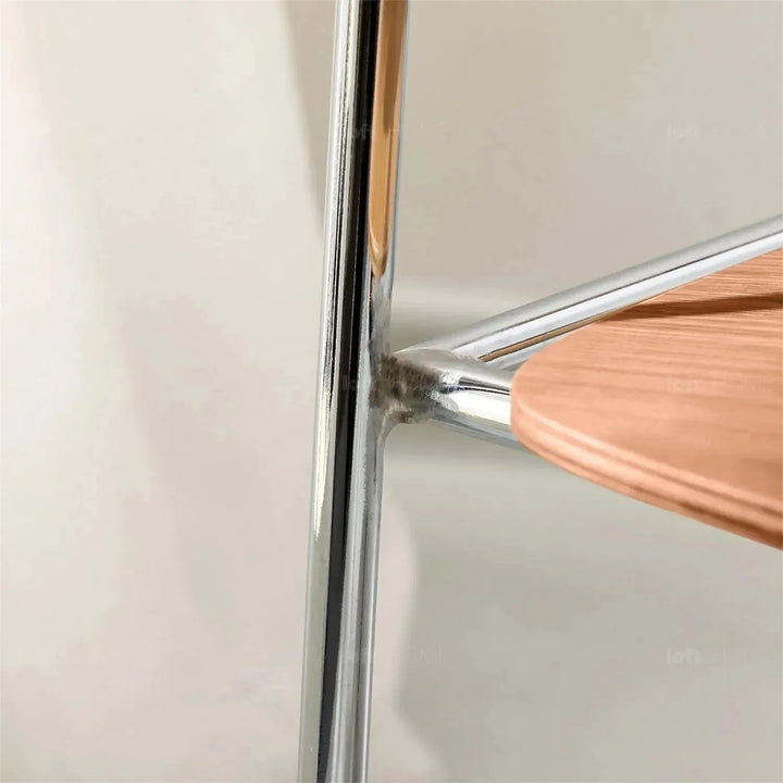 Industrial wood dining chair co in still life.