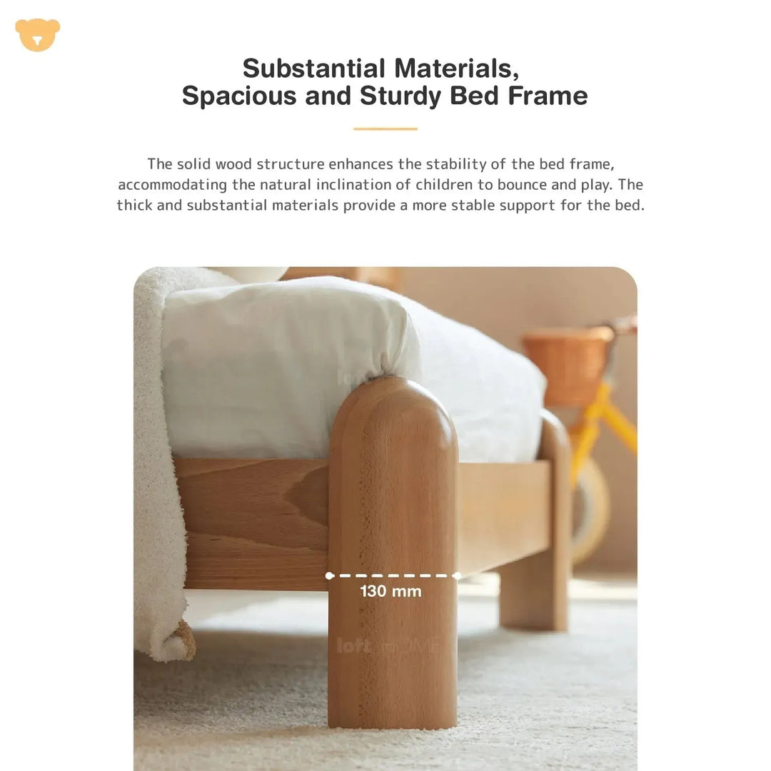 Scandinavian wood kids bed teddy with context.