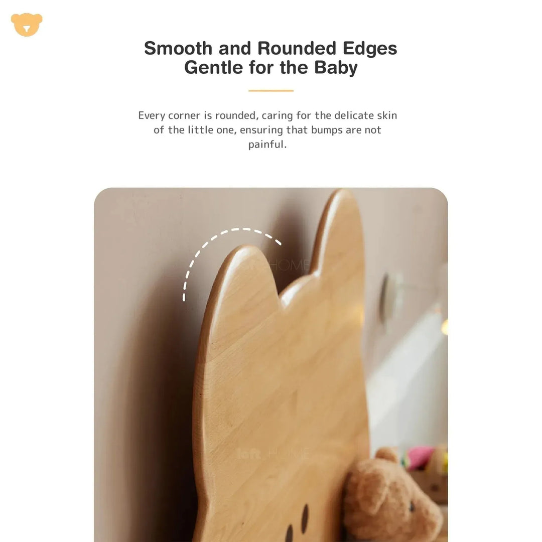 Scandinavian wood kids bed teddy in panoramic view.