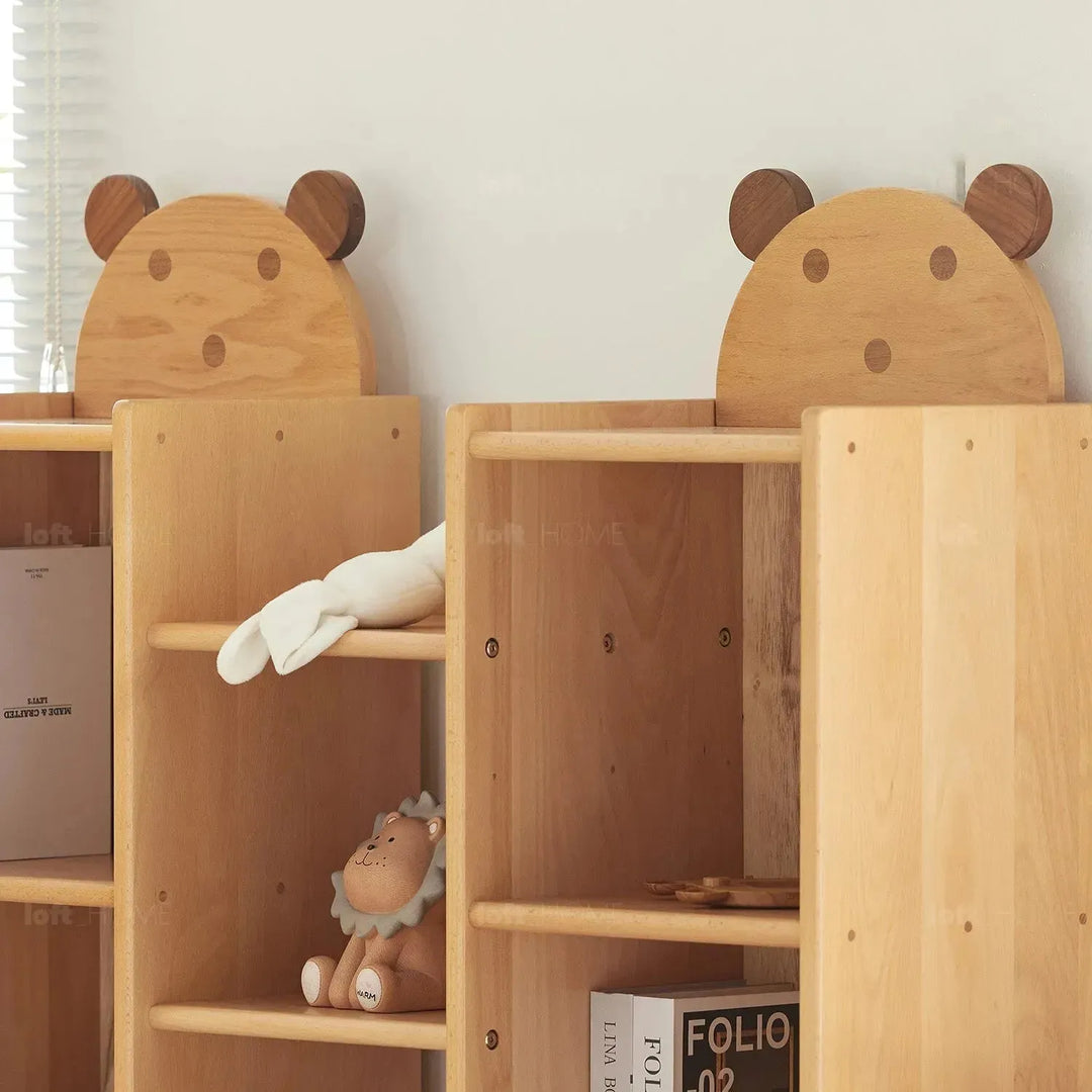 Scandinavian wood kids bookshelf bear in still life.