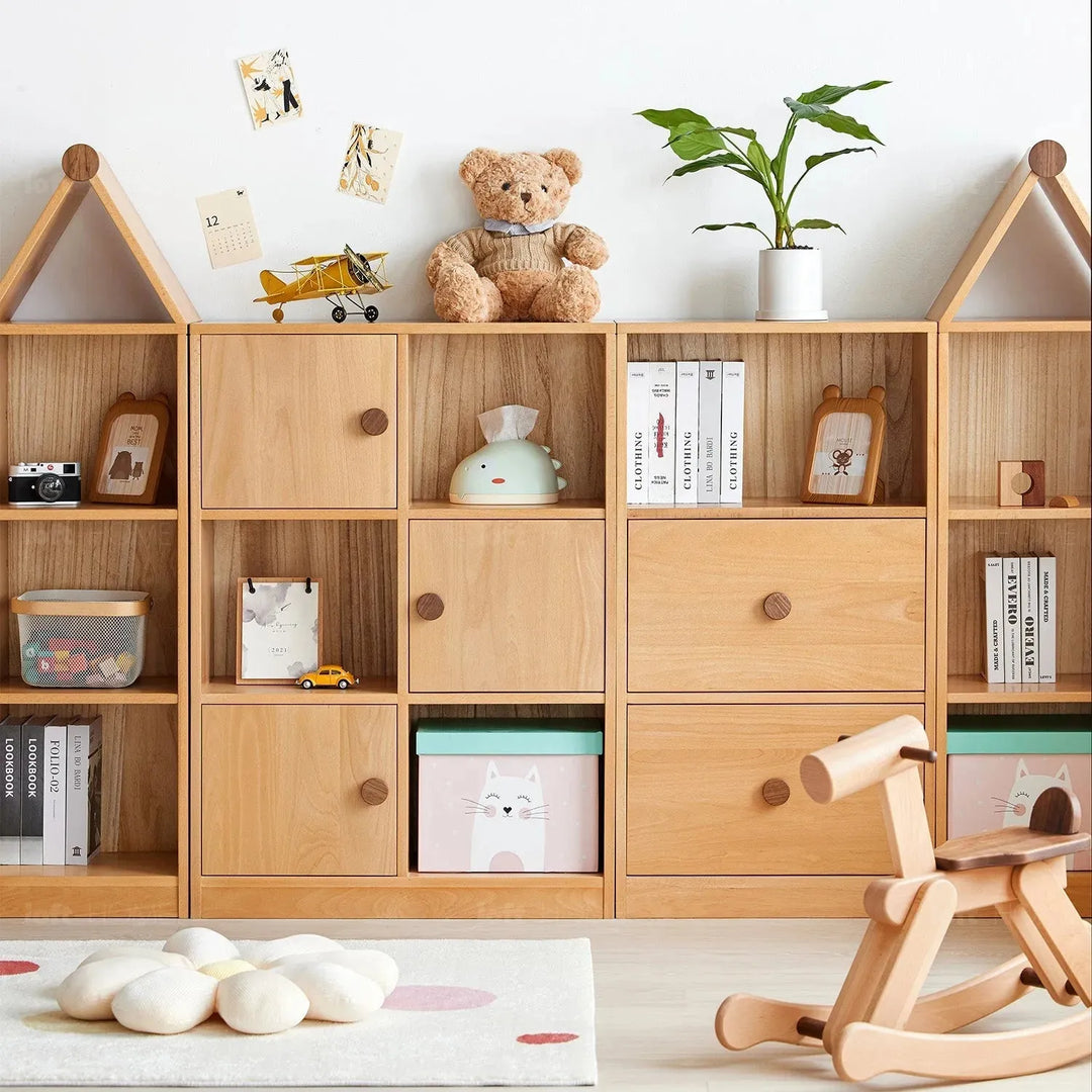 Scandinavian wood kids bookshelf house in close up details.