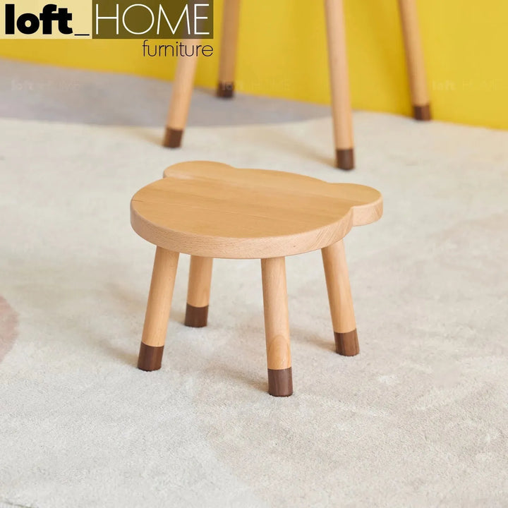 Scandinavian wood kids stool bear primary product view.