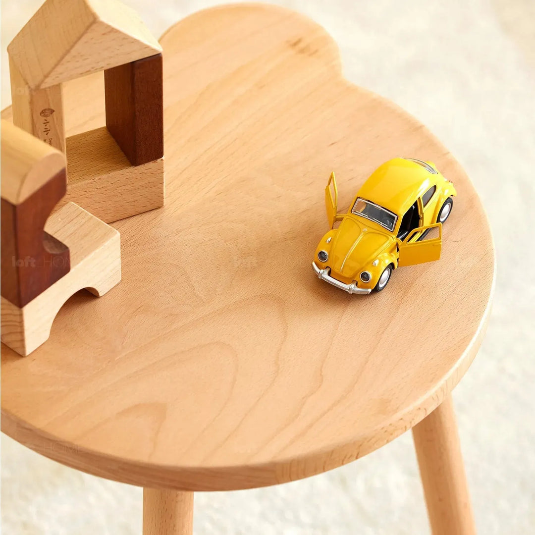Scandinavian wood kids stool bear material variants.