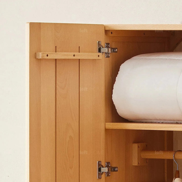 Scandinavian wood kids wardrobe bear in still life.