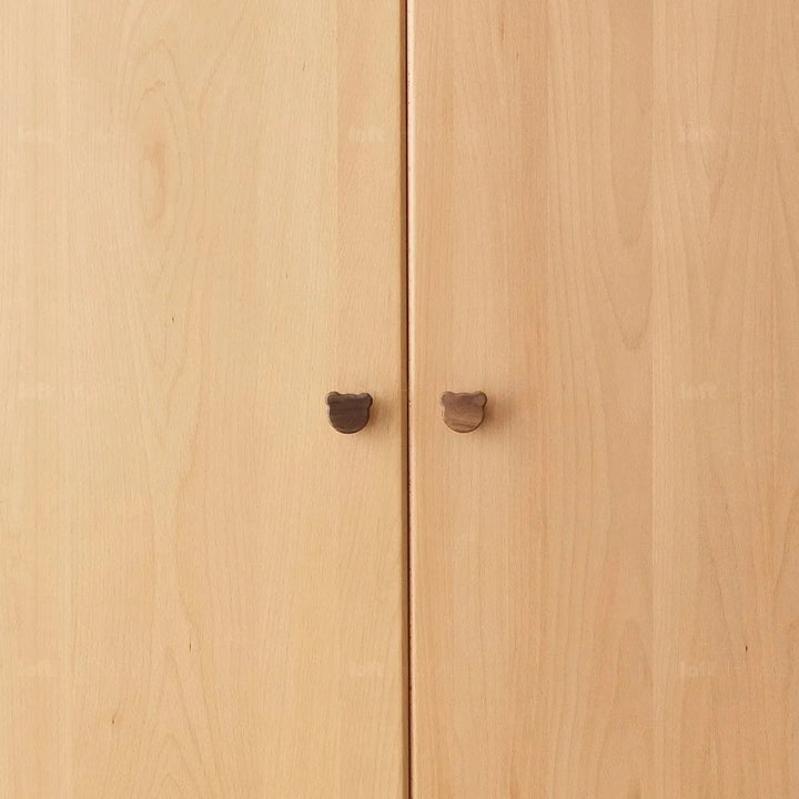 Scandinavian wood kids wardrobe bear color swatches.