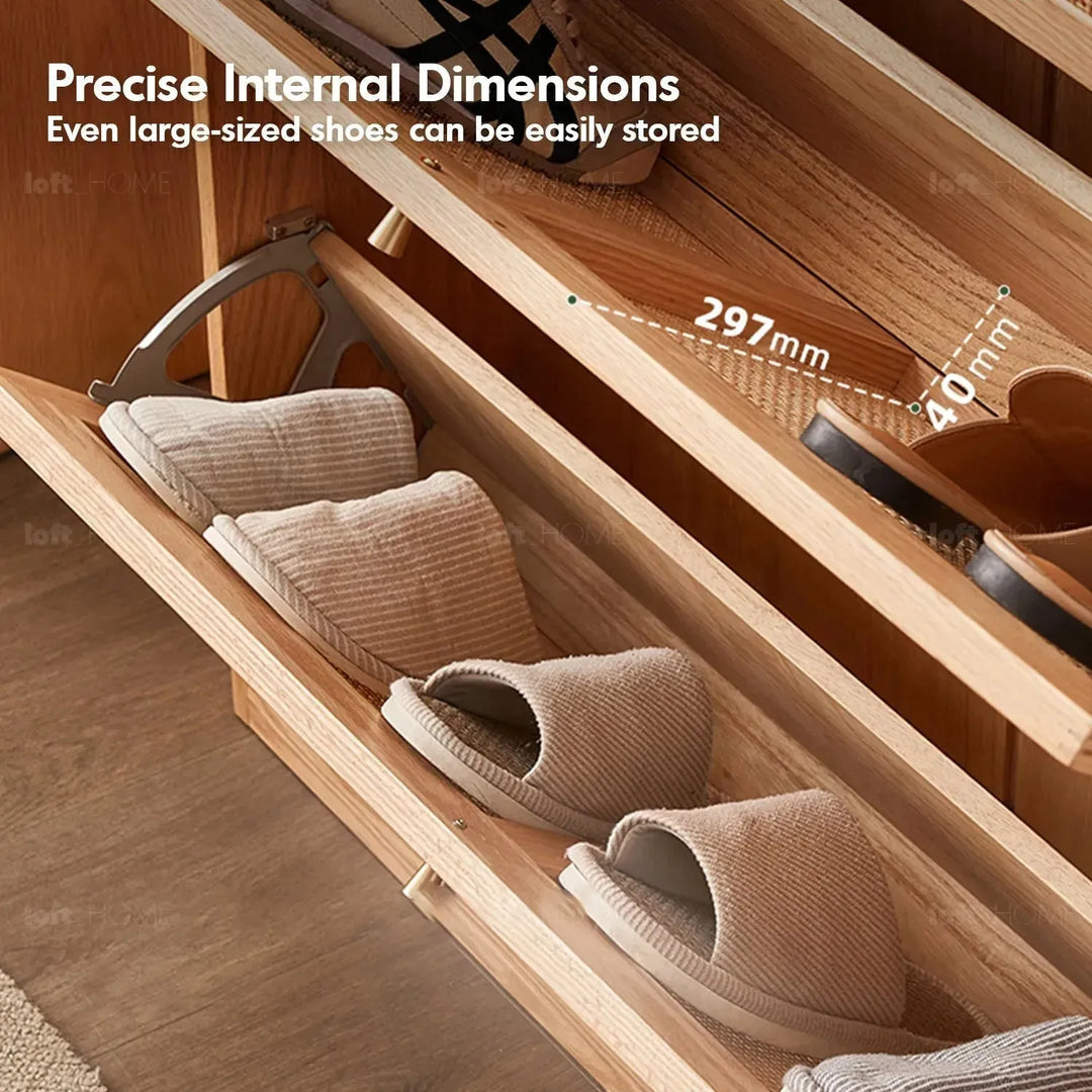 Scandinavian wood shoe cabinet vine weave in close up details.