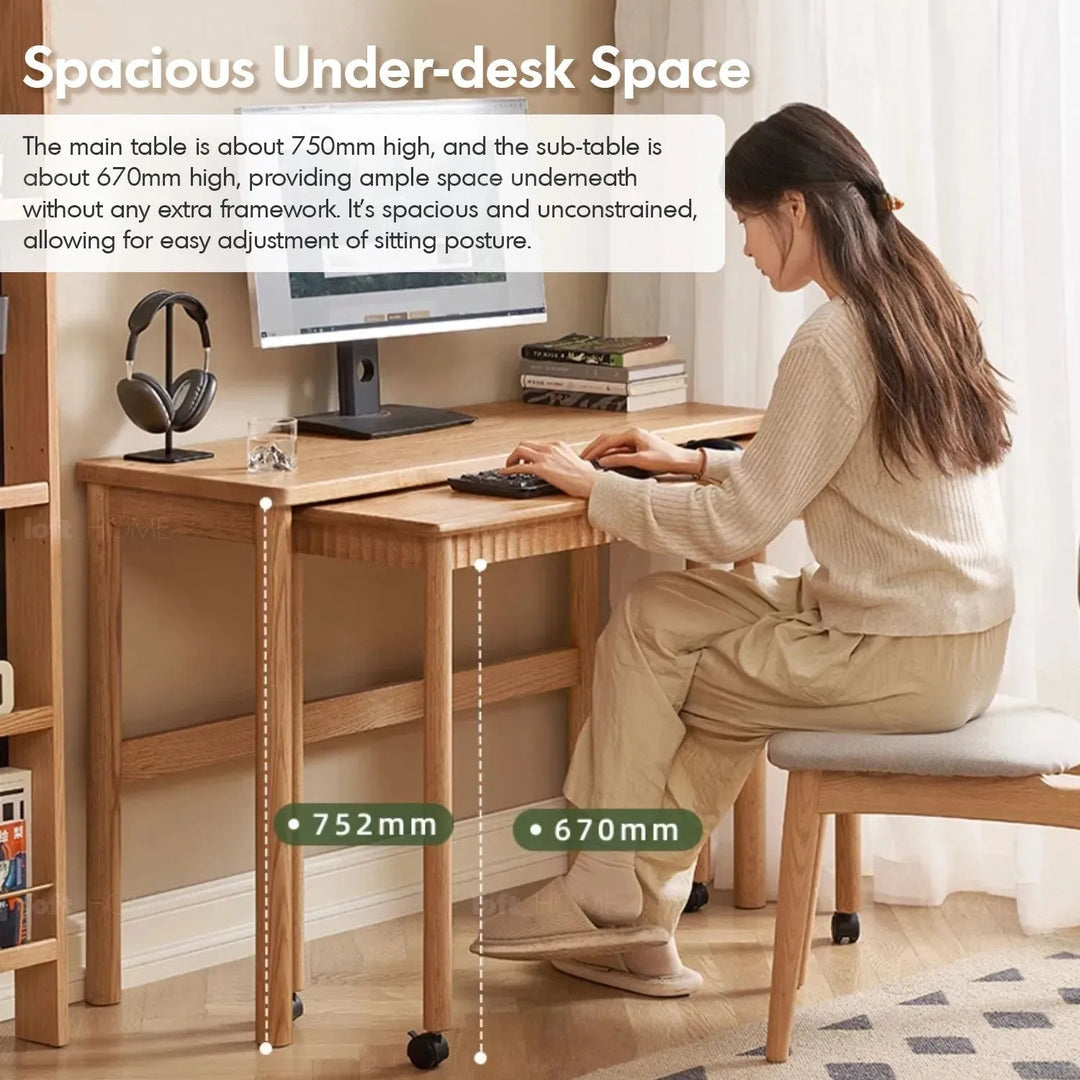 Scandinavian wood caster wheel extendable study table twin layer in panoramic view.