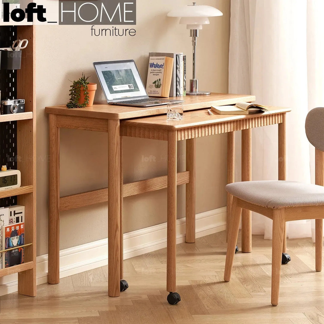 Scandinavian wood caster wheel extendable study table twin layer primary product view.
