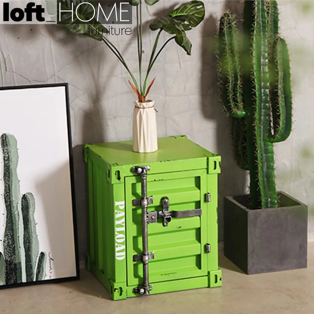 Industrial steel side table container in still life.