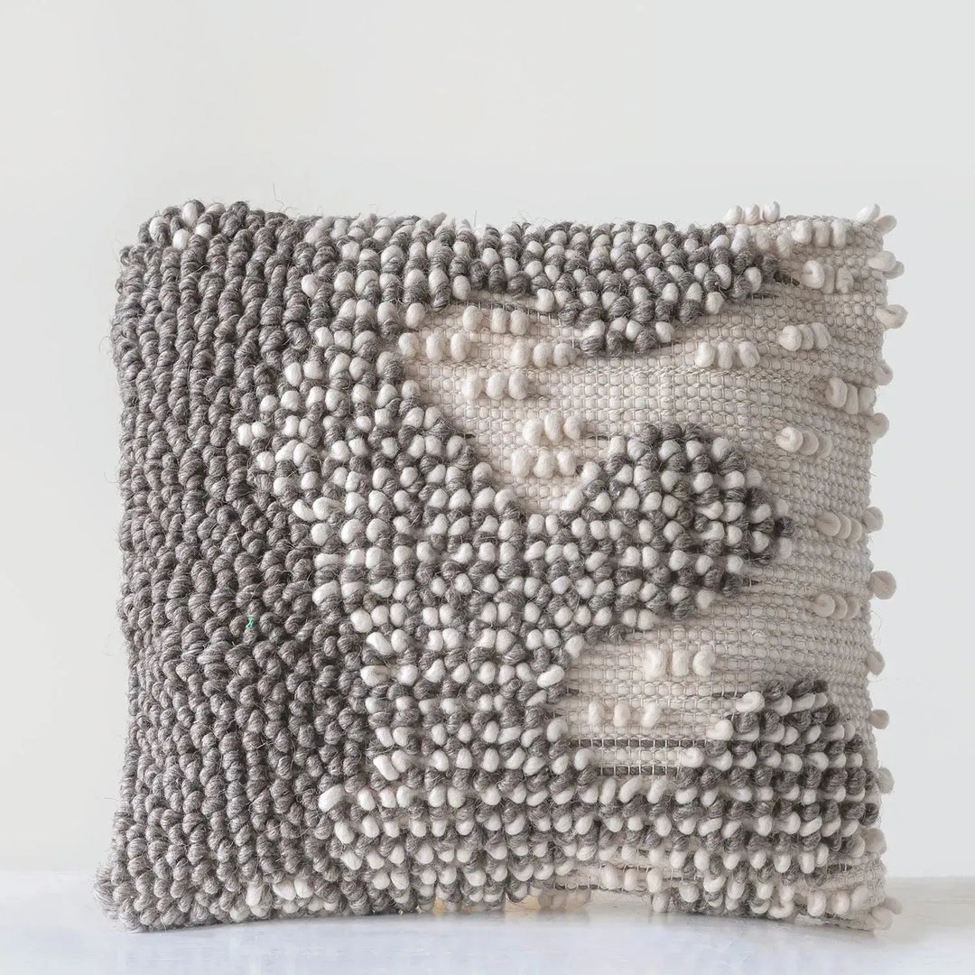 Versatile hand-woven wool looped pillow color swatches.