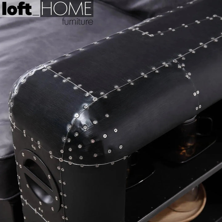 Industrial aluminium genuine leather 3 seater sofa black aircraft in close up details.