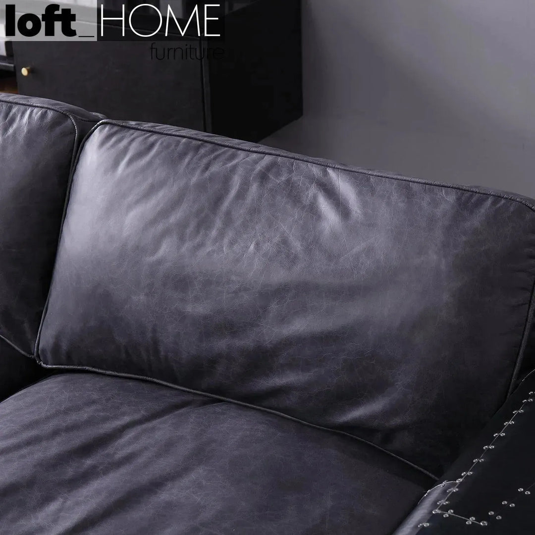 Industrial aluminium genuine leather 3 seater sofa black aircraft in still life.