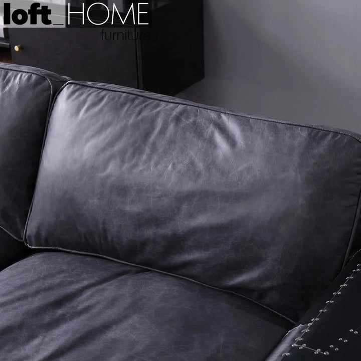 Industrial aluminium genuine leather 3 seater sofa black aircraft in still life.