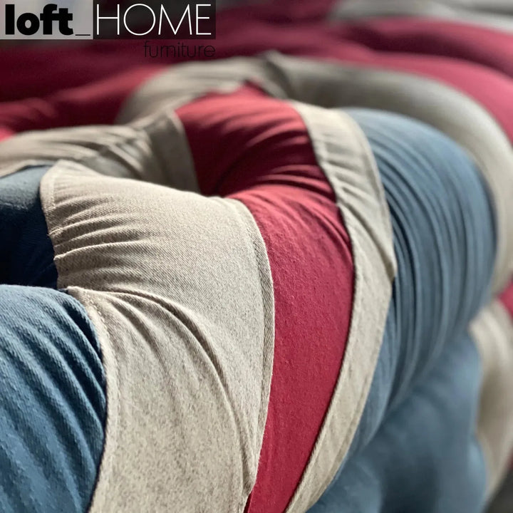 Vintage denim fabric 2 seater sofa union jack chesterfield in panoramic view.