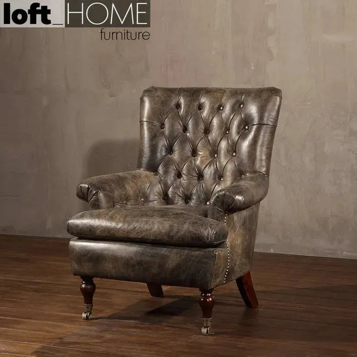 Vintage genuine leather 1 seater sofa retro in panoramic view.