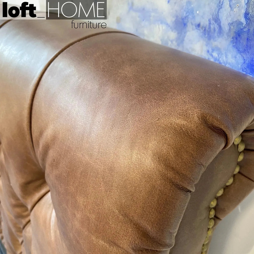 Vintage genuine leather bed frame chesterfield in still life.