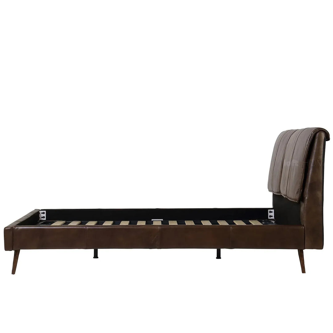 Vintage genuine leather bed frame saddleback in close up details.