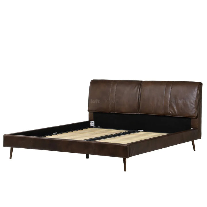 Vintage genuine leather bed frame saddleback with context.