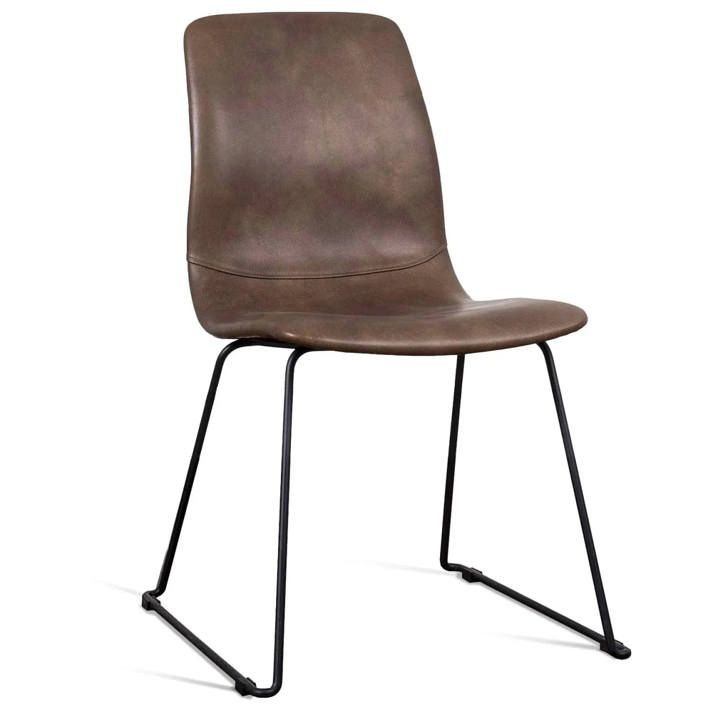 Industrial genuine leather dining chair oakley ii in white background.