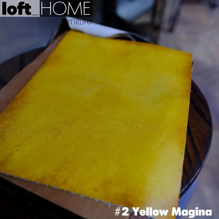 Vintage genuine leather ottoman chesterfield in close up details.