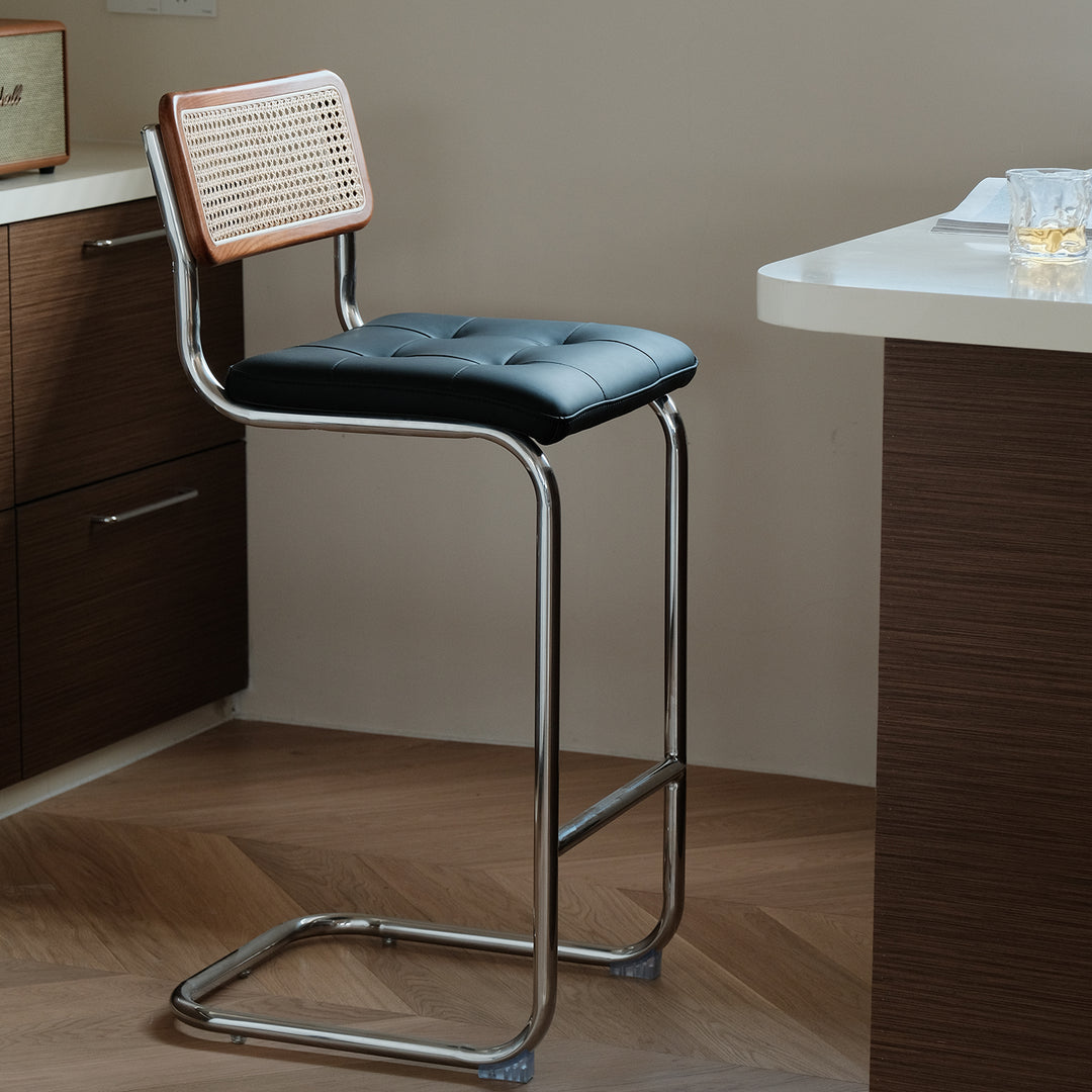 Vintage rattan pu leather bar chair hoh xil in panoramic view.