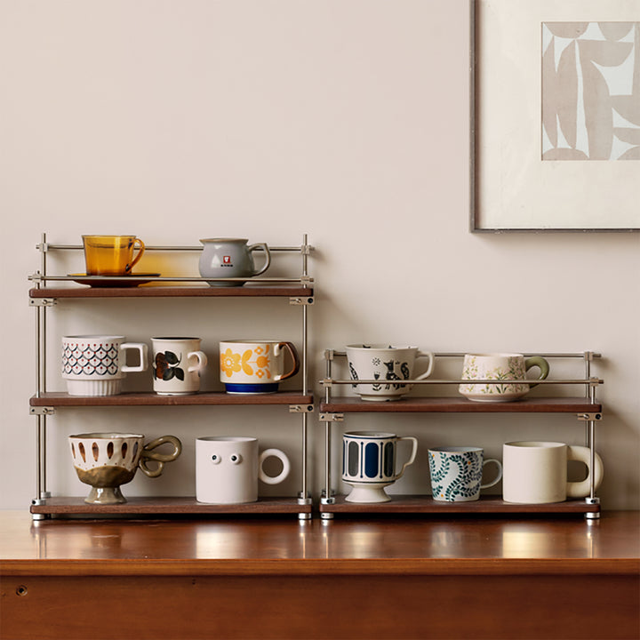 Vintage sapele wood stainless steel shelf packer in panoramic view.