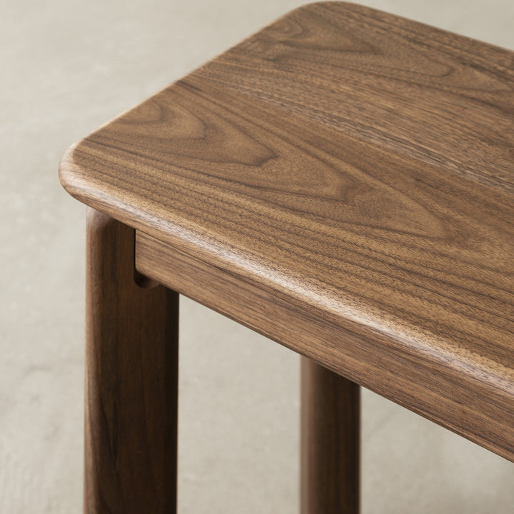 Vintage walnut wood dining bench riverin with context.