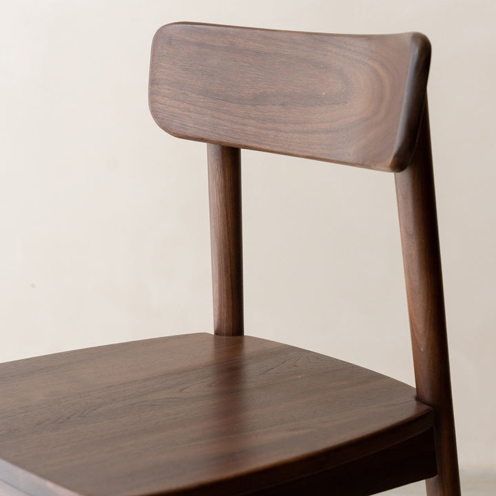 Vintage walnut wood dining chair green in details.